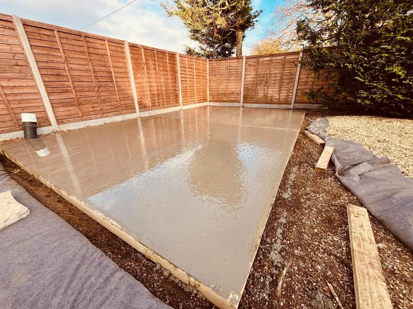 Concrete shed base - Four Corners Landscaping
